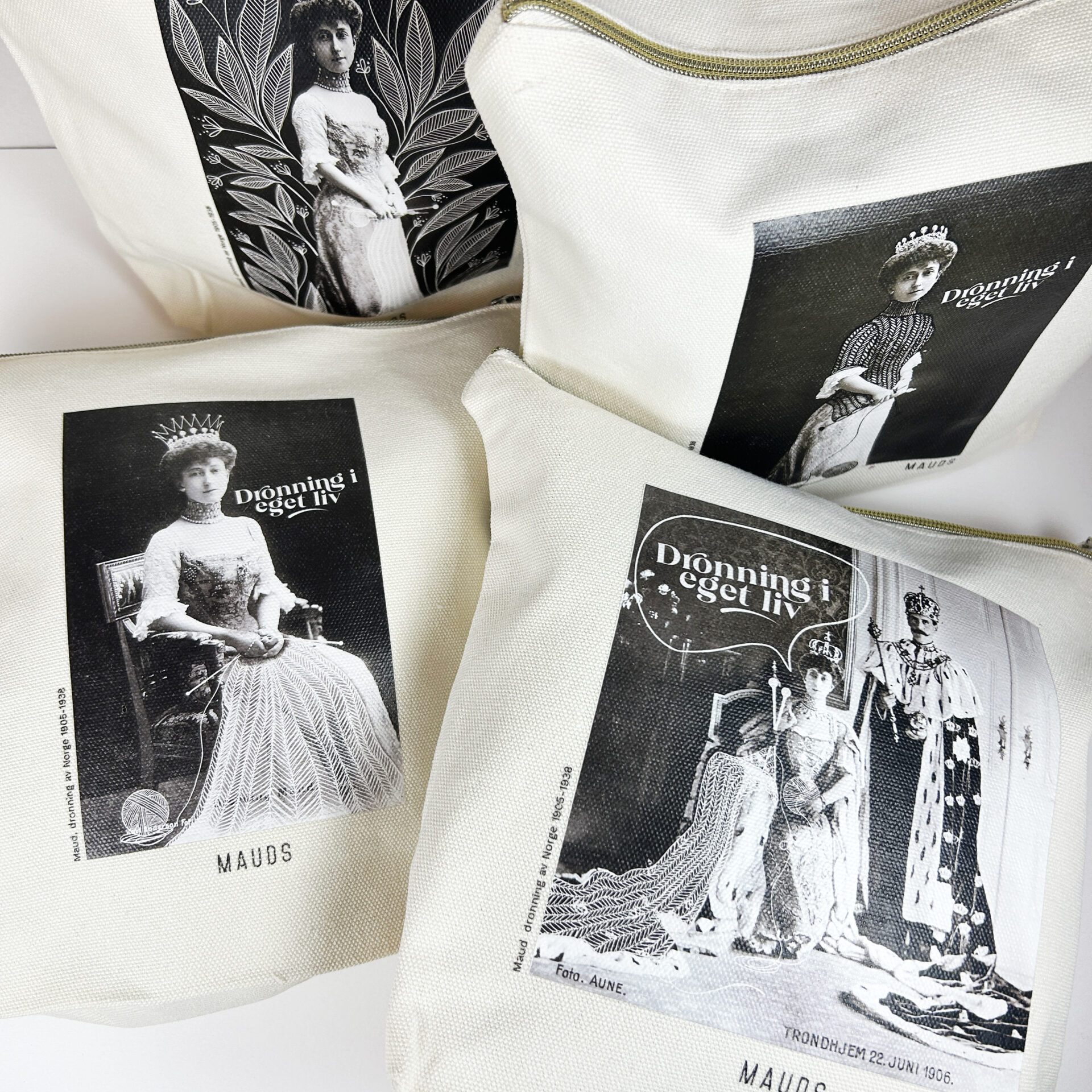 fire oppbevaringsmapper med ulike bilder av maud på forsiden og teksten dronning i eget liv
