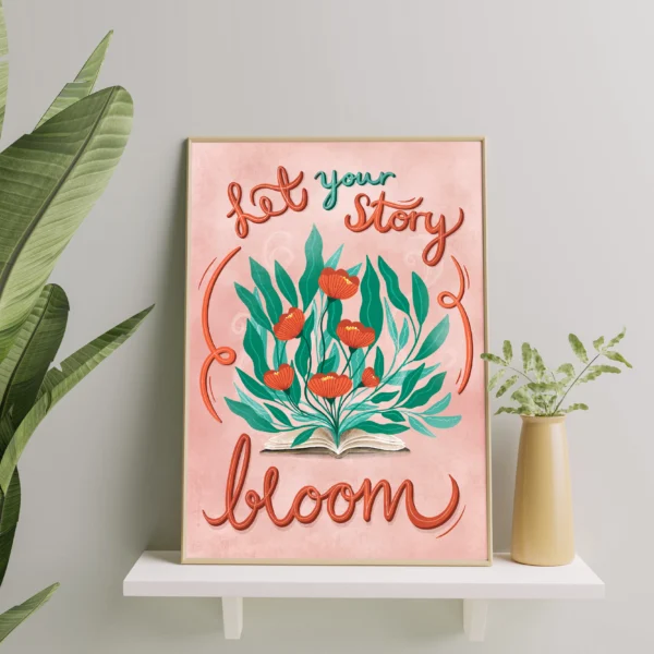 Bilde av en innrammet Plakat med en bok og blomster og teksten 'Let your story bloom', designet av Poppydesign